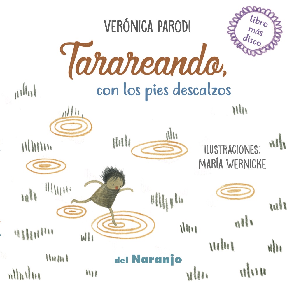 Tarareando, con los pies descalzos